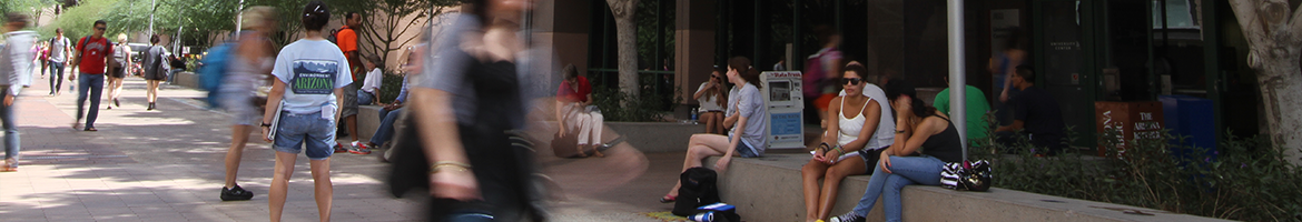 college students walking and sitting at the ASU campus