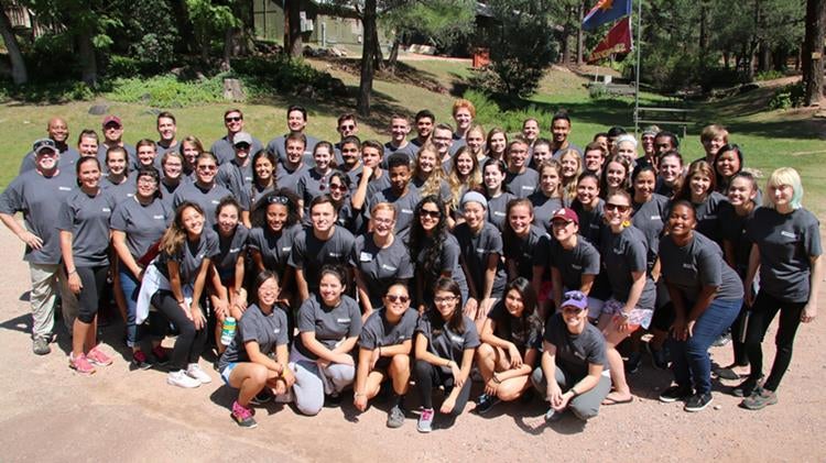 More than 60 students in the Next Generation Service Corps pose with staff and volunteers during leadership training at Camp Tontozona.